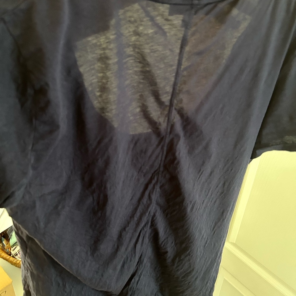 Navy. Lily V neck with “texture” in cotton. Long in torso